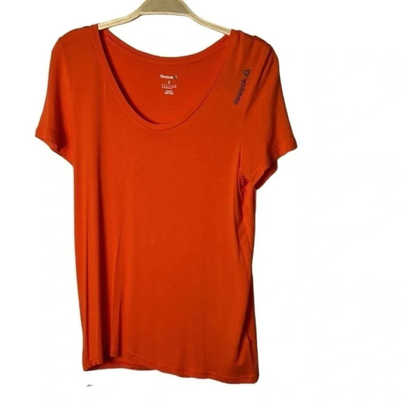REEBOK. Orange activewear tee shirt . Logos ,scoop neckline , longer cap sleeve - Picture 1 of 7